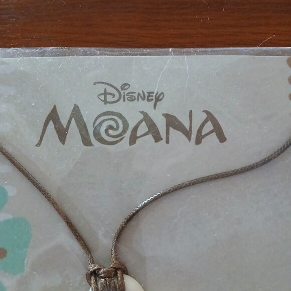 Disney Moana Cream Flower Brown Cord Necklace NIP - Picture 2 of 7